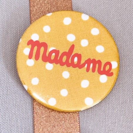 BADGE